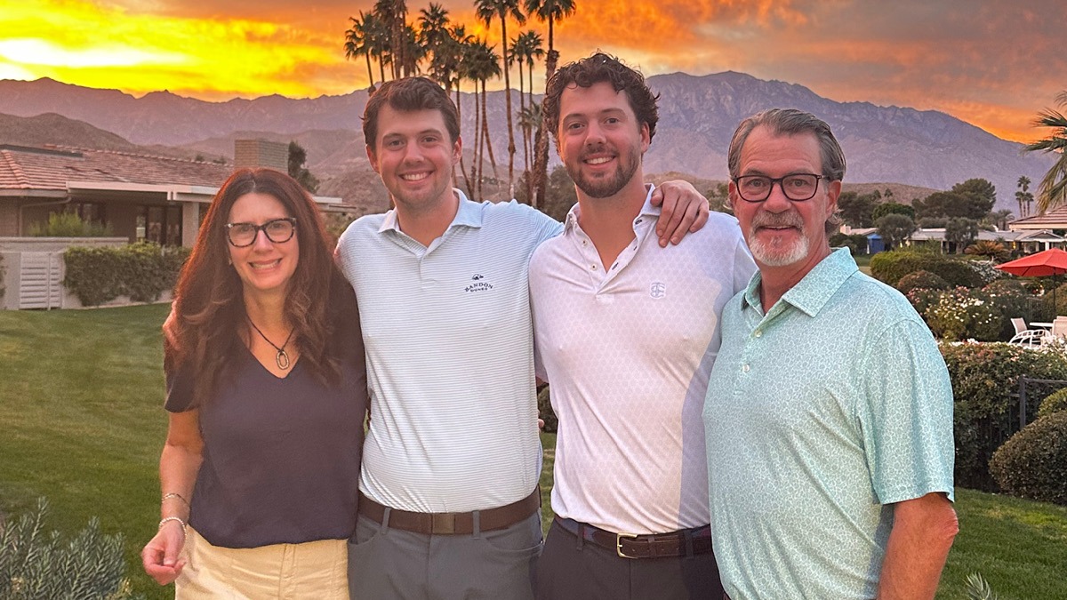 Dena Herbolich with her husband and two sons