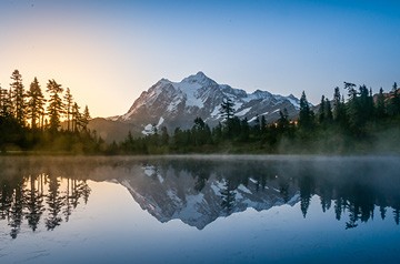 Snow-capped mountain reflected in a lake