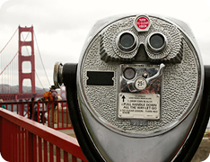 coin operated telescope pointing toward Golden Gate Bridge