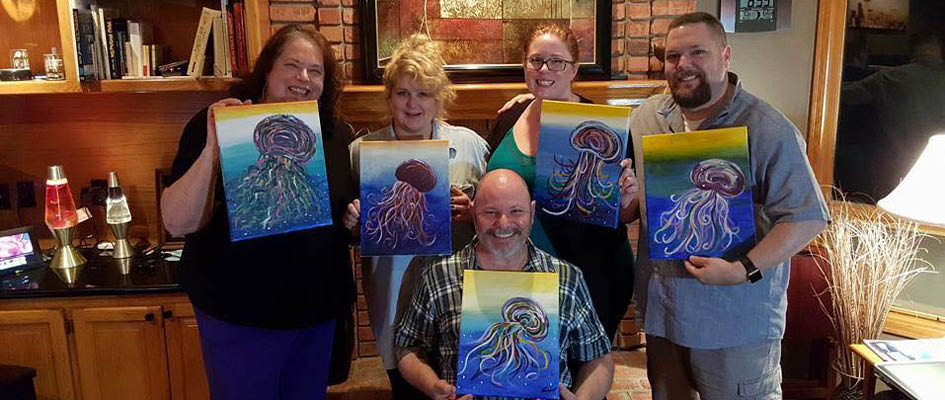 Kristi Moore at a paint and sip event with her family